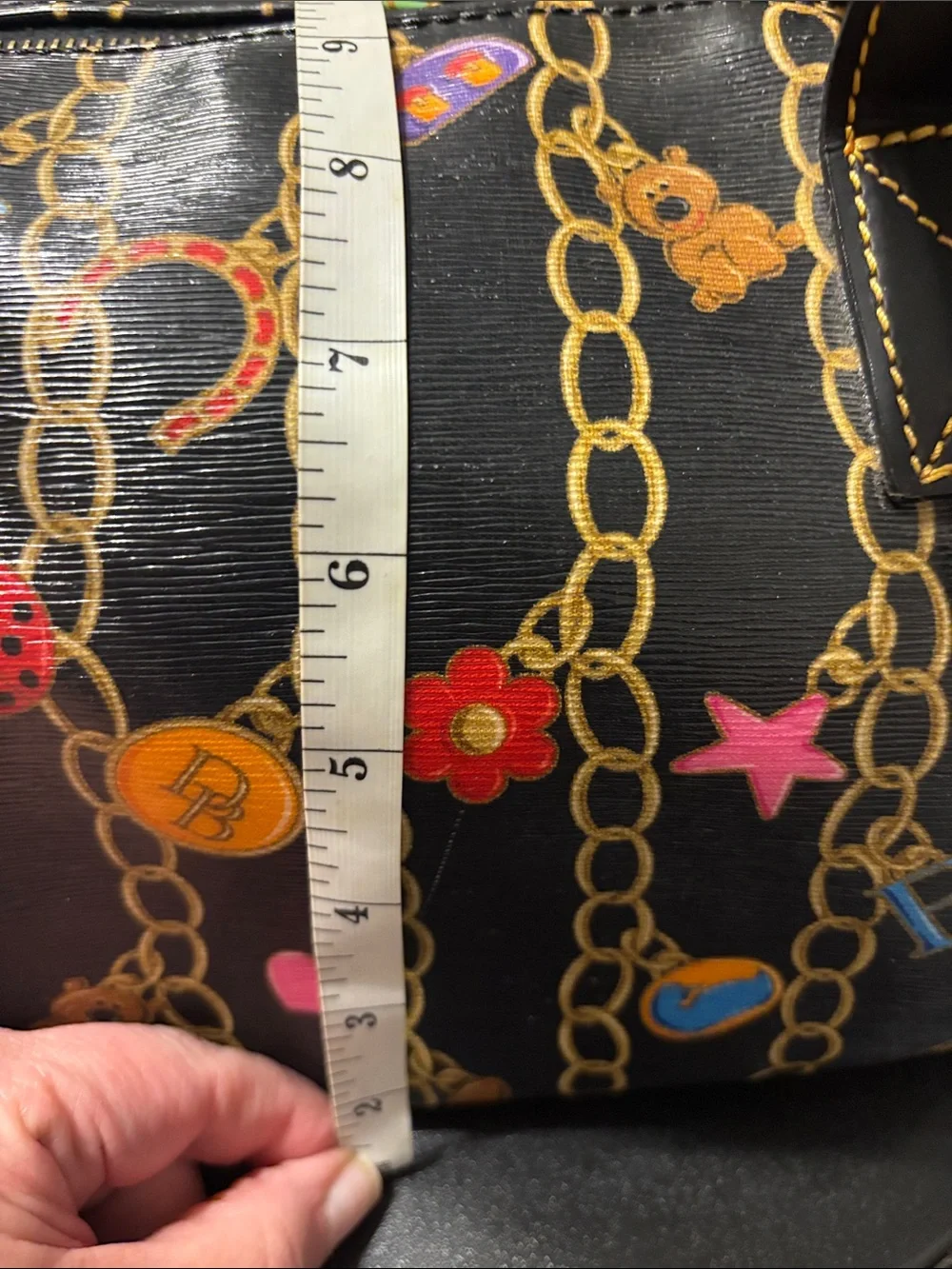 Dooney & Bourke Black Satchel with Multicolor Chain Charm Print